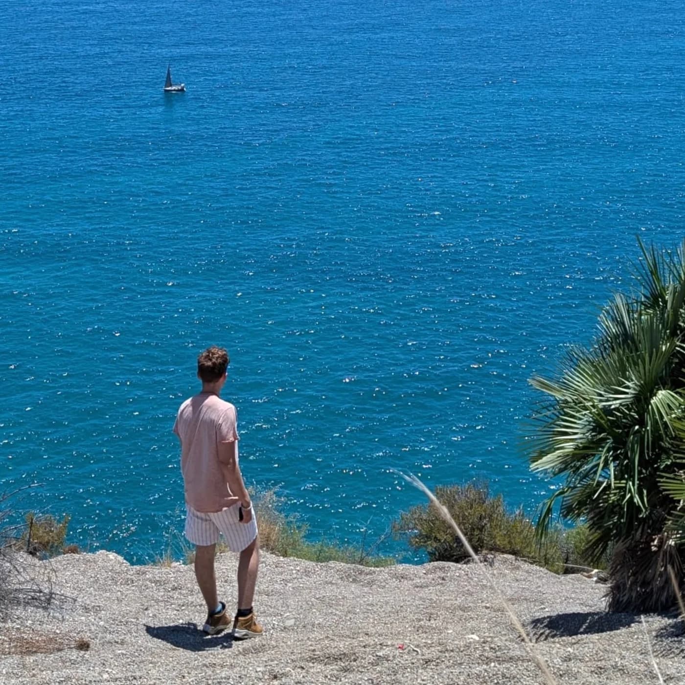 Liam Ryngaert looking out over the sea